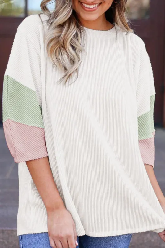 Color Block Ribbed Knit Three-Quarter Sleeve Top sold by Charming Charlie