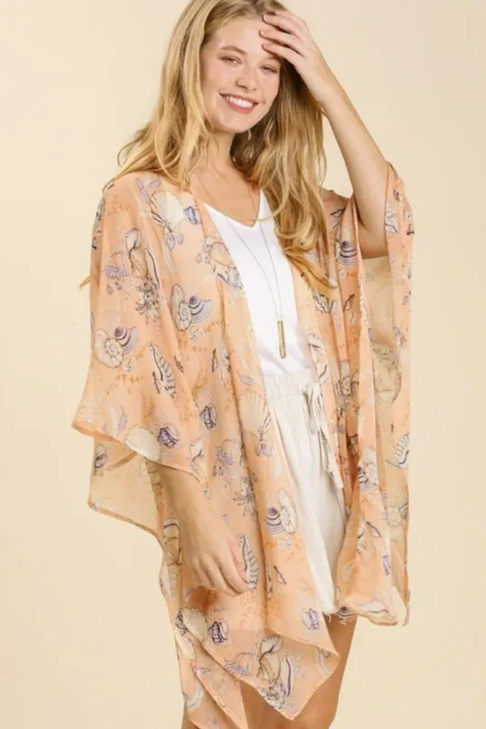 Umgee Full Size Sheer Mixed Print Kimono with Side Slit Plus Size sold by Charming Charlie