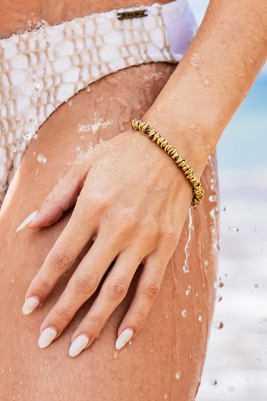 18K STAINLESS STEEL TWISTED BEAD BRACELET sold by Charming Charlie