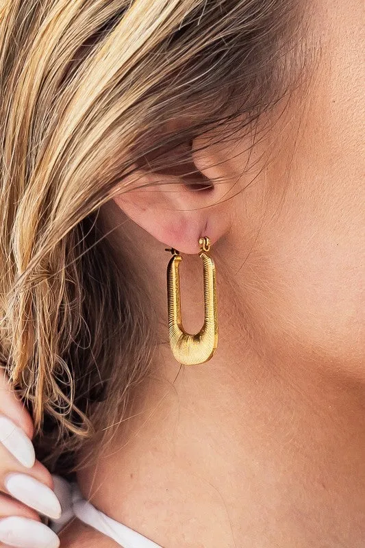 18K STAINLESS STEEL MINI RECTANGLE HOOP EARRING sold by Charming Charlie