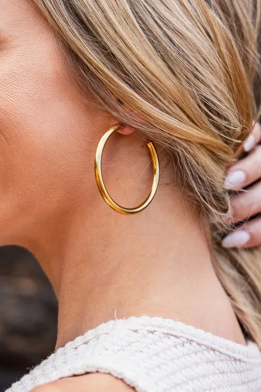 14K STAINLESS STEEL OPEN HOOP EARRINGS sold by Charming Charlie