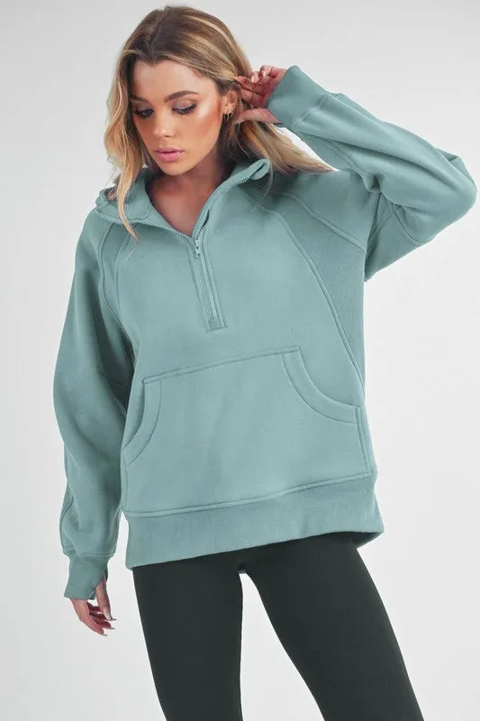 Aemi+Co Half Zip Raglan Sleeve Sweatshirt with Kangaroo Pocket sold by Charming Charlie