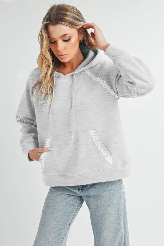 Aemi + Co Lace Detail Drawstring Hoodie with Kangaroo Pocket sold by Charming Charlie