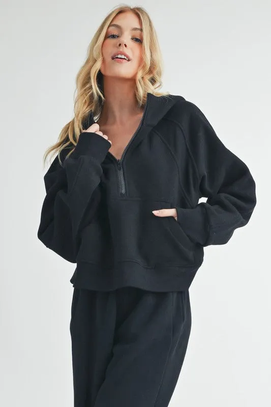 Aemi + Co Half Zip Raglan Sleeve Hoodie with Kangaroo Pocket sold by Charming Charlie