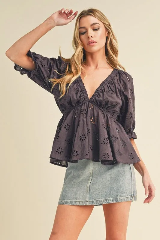 Aemi + Co Eyelet Embroidered V-Neck Half Sleeve Peplum Blouse sold by Charming Charlie