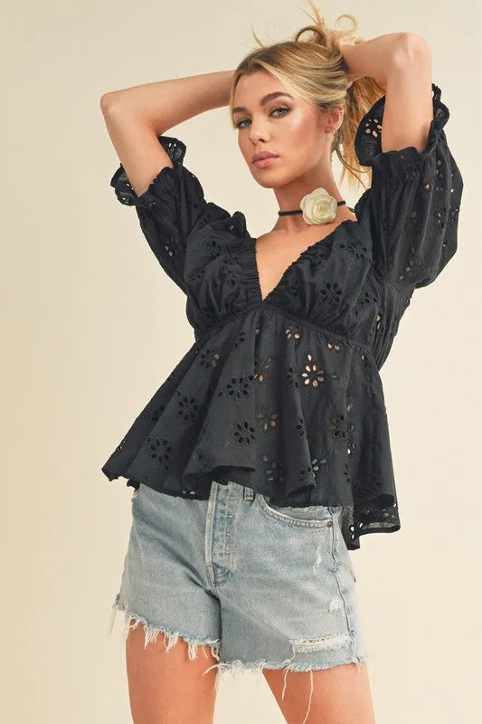 Aemi + Co Eyelet Embroidered V-Neck Half Sleeve Peplum Blouse sold by Charming Charlie
