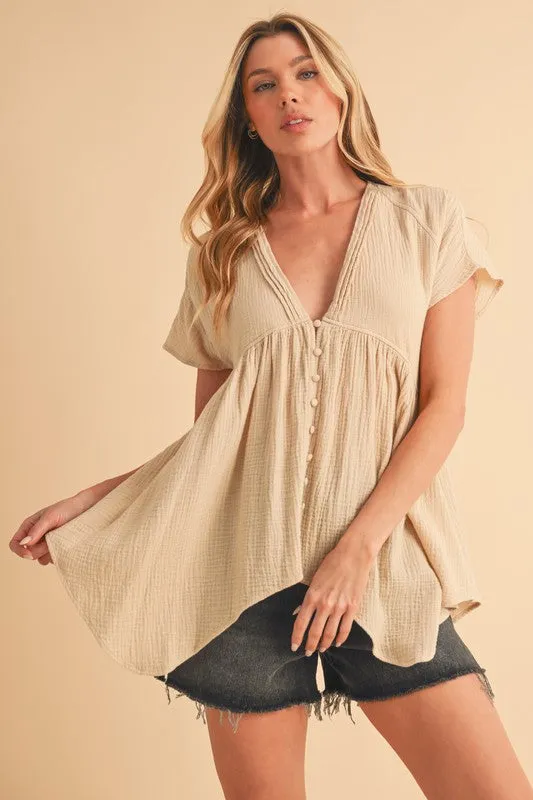 Aemi + Co Tuck Detail V-Neck Short Sleeve Blouse sold by Charming Charlie