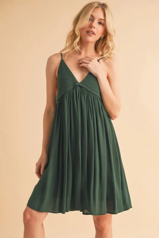 Aemi + Co Ruched Plunge Mini Cami Dress sold by Charming Charlie
