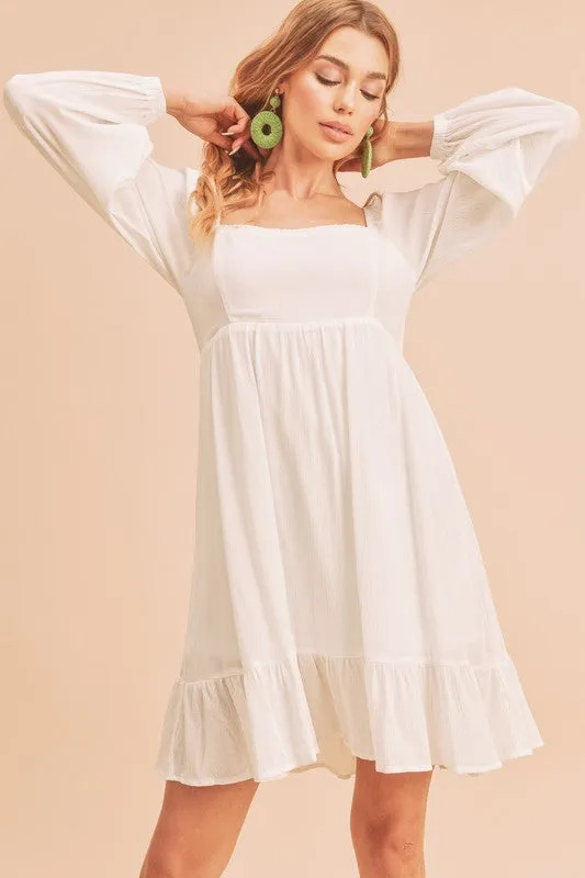 Aemi + Co Ruffled Hem Square Neck Balloon Sleeve Mini Dress sold by Charming Charlie