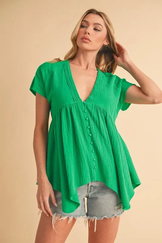Aemi + Co Tuck Detail V-Neck Short Sleeve Blouse sold by Charming Charlie