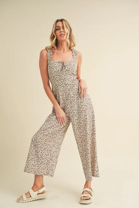 Aemi + Co Floral Sweetheart Neck Wide Leg Jumpsuit sold by Charming Charlie