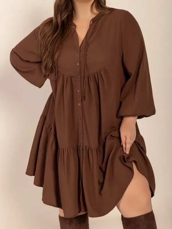 Plus Size Tie Neck Balloon Sleeve Tiered Dress sold by Charming Charlie