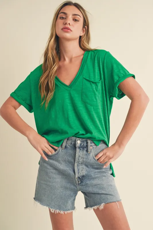 Aemi + Co Side Slit V-Neck Short Rolled Sleeve T-Shirt sold by Charming Charlie