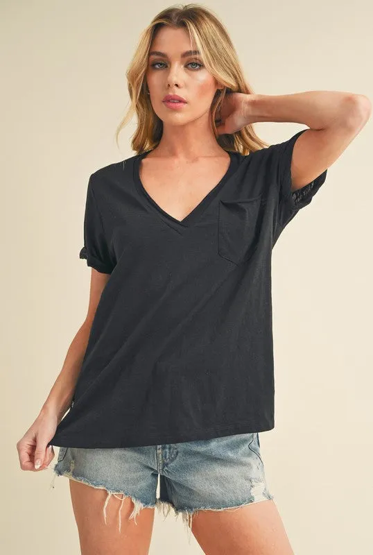 Aemi + Co Side Slit V-Neck Short Rolled Sleeve T-Shirt sold by Charming Charlie