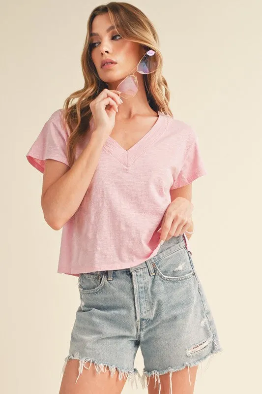 Aemi + Co Side Slit V-Neck Short Sleeve Cropped T-Shirt sold by Charming Charlie