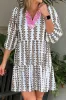 Printed Notched 3/4 Sleeve Mini Dress sold by Charming Charlie