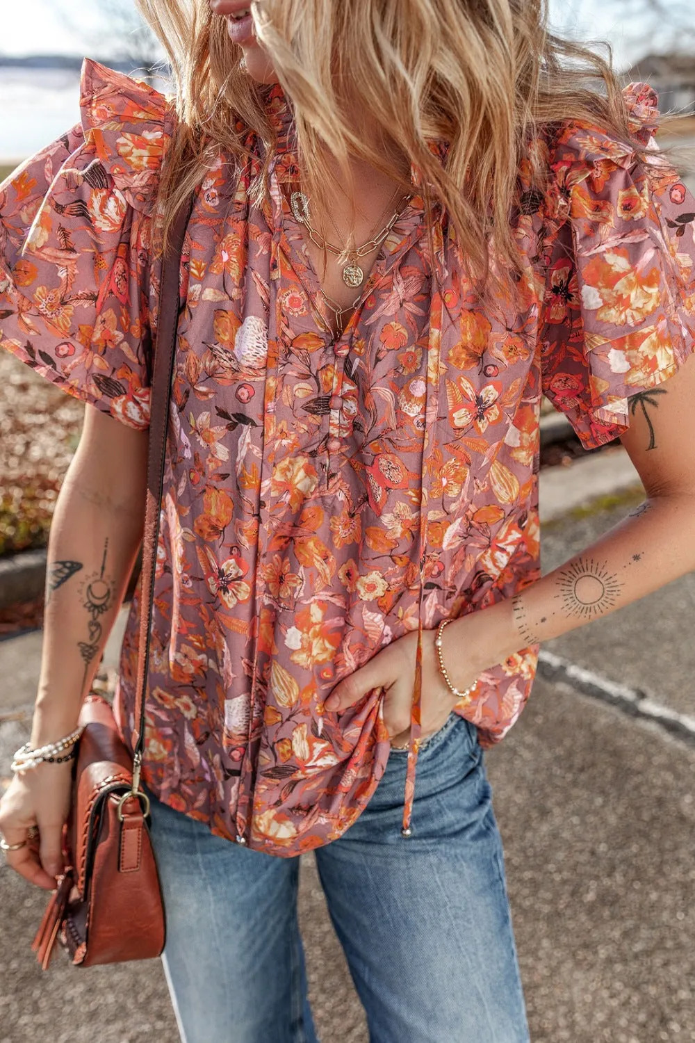 Floral Ruffled Layered Short Sleeve Tie Neck Blouse sold by Charming Charlie