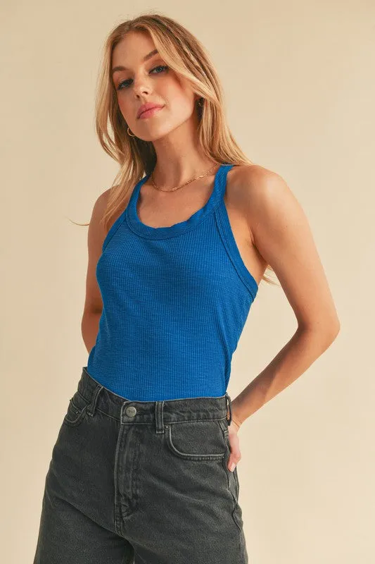 Aemi + Co Scoop Neck Ribbed Tank sold by Charming Charlie
