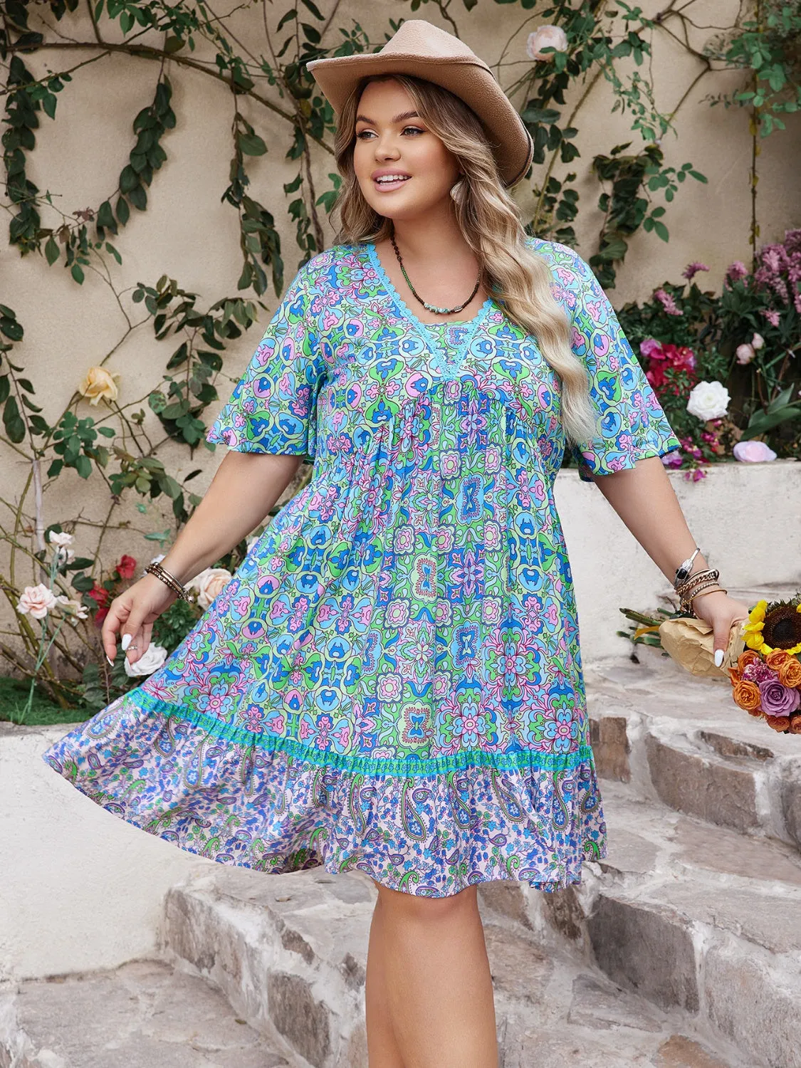 Plus Size Ruffled Hem Lace Detail Printed Half Sleeve Dress sold by Charming Charlie