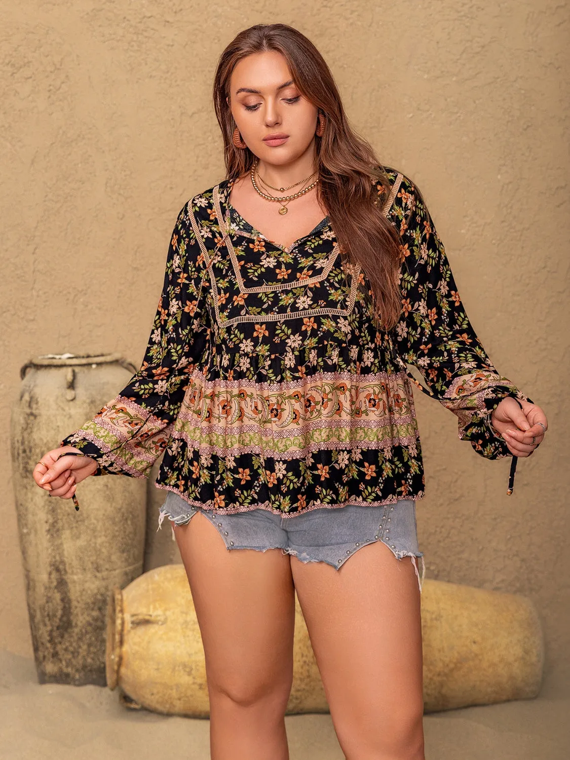 Plus Size Printed Tie Neck Balloon Sleeve Blouse sold by Charming Charlie