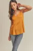 Aemi + Co Tie Back V-Neck Cami sold by Charming Charlie