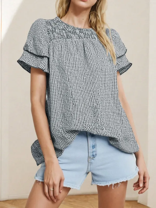 Smocked Plaid Round Neck Layered Short Sleeve Blouse sold by Charming Charlie