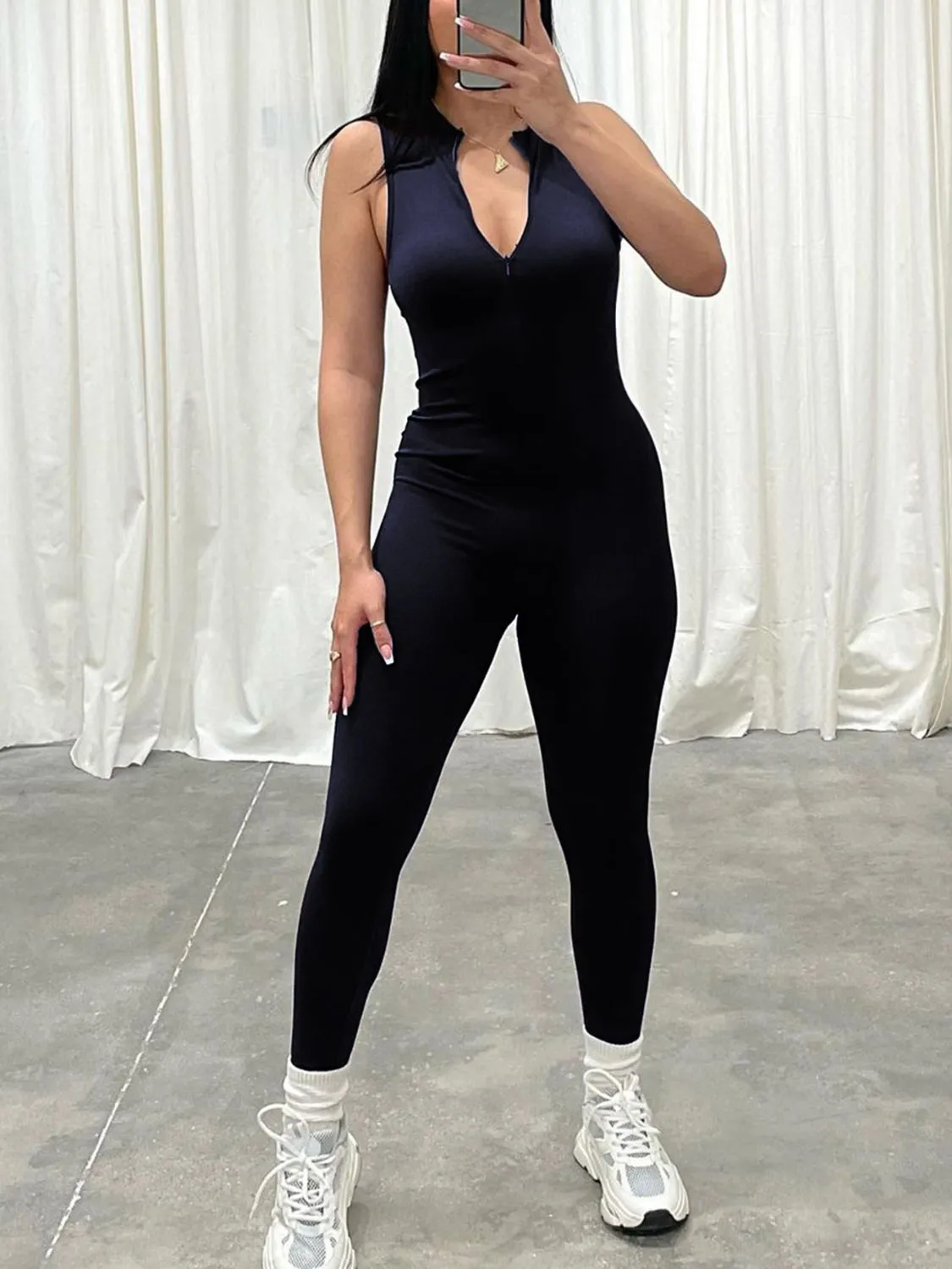 Devine Notched Sleeveless Jumpsuit sold by Charming Charlie product image thumbnail 2