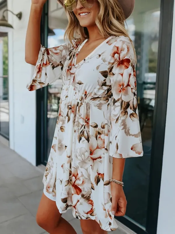 Floral V-Neck Three-Quarter Sleeve Mini Dress sold by Charming Charlie