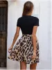 Tied Front Contrast Leopard Short Sleeve Mini Dress sold by Charming Charlie