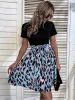 Tied Front Contrast Leopard Short Sleeve Mini Dress sold by Charming Charlie