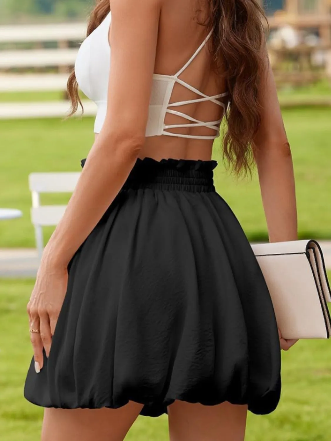 Frill Smocked Mini Skirt sold by Charming Charlie product image thumbnail 5