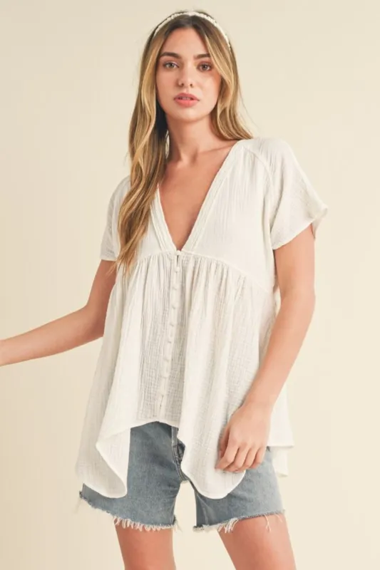 Aemi + Co Tuck Detail V-Neck Short Sleeve Blouse sold by Charming Charlie