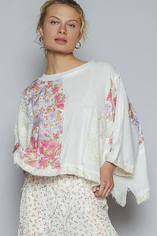 POL Floral Lace Patch Round Neck Double Gauze Top sold by Charming Charlie