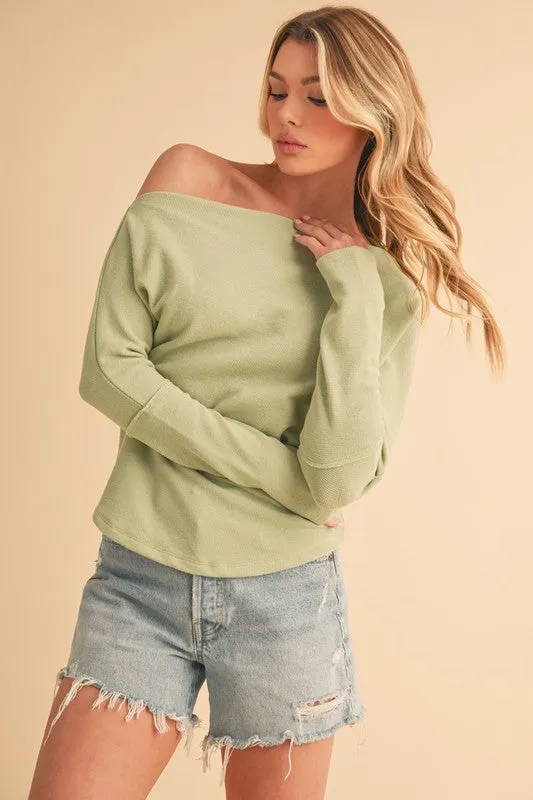 Aemi + Co One Shoulder Long Sleeve Knit Top sold by Charming Charlie