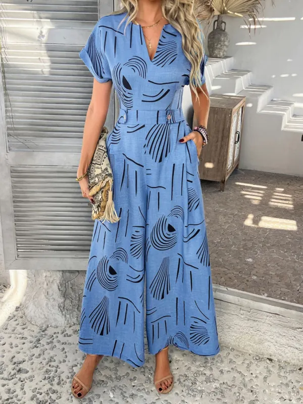 Devine Printed Notched Short Sleeve Wide Leg Jumpsuit sold by Charming Charlie