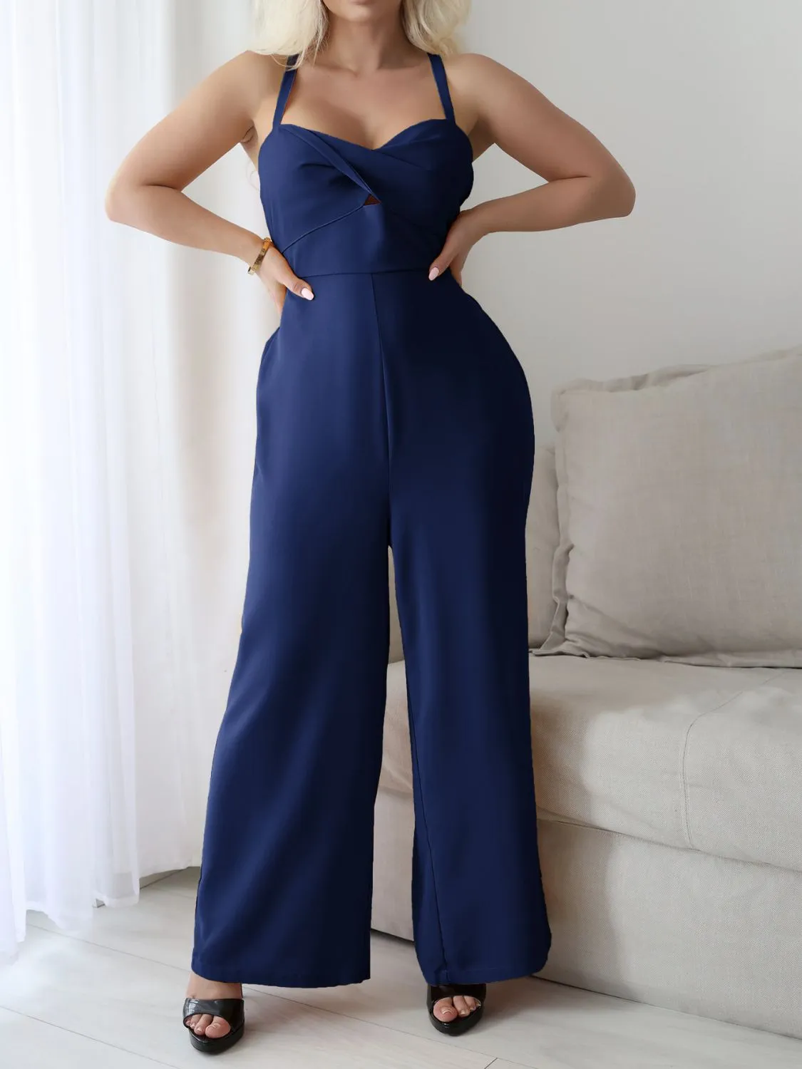 Devine Tie Back Backless Crisscross Jumpsuit sold by Charming Charlie