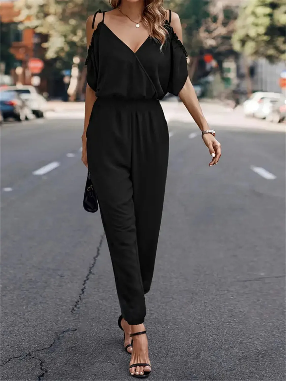 Surplice Tied Spaghetti Strap Jumpsuit sold by Charming Charlie