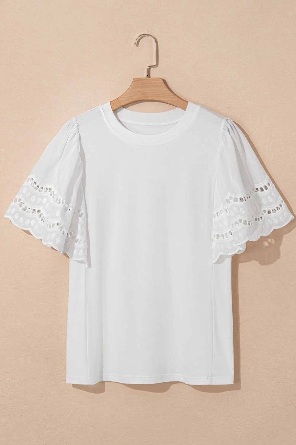 Hollow Out Embroidered Short Sleeve Round Neck Top sold by Charming Charlie product image thumbnail 5