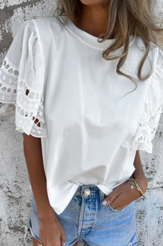 Hollow Out Embroidered Short Sleeve Round Neck Top sold by Charming Charlie