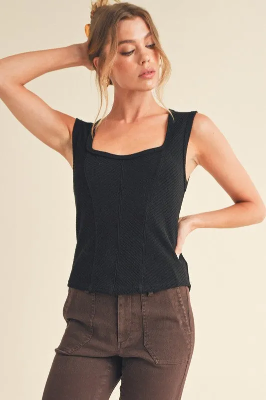 Aemi + Co Exposed Seam Ribbed Wide Strap Tank sold by Charming Charlie