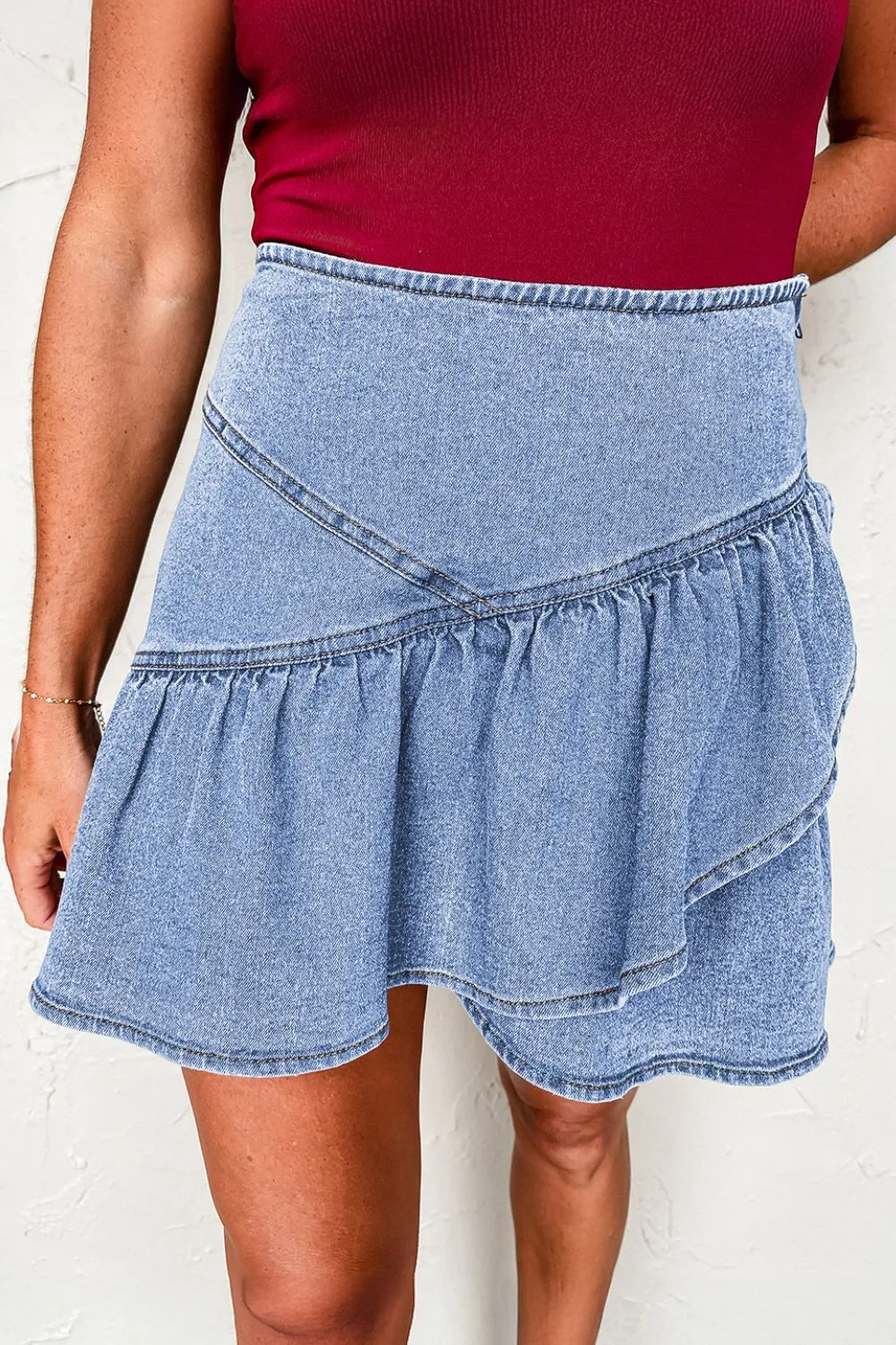 Asymmetric Ruffle Overlay Denim Mini Skirt sold by Charming Charlie