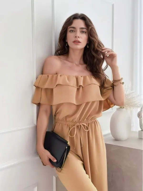 Ruffled Off-Shoulder Wide Leg Jumpsuit sold by Charming Charlie
