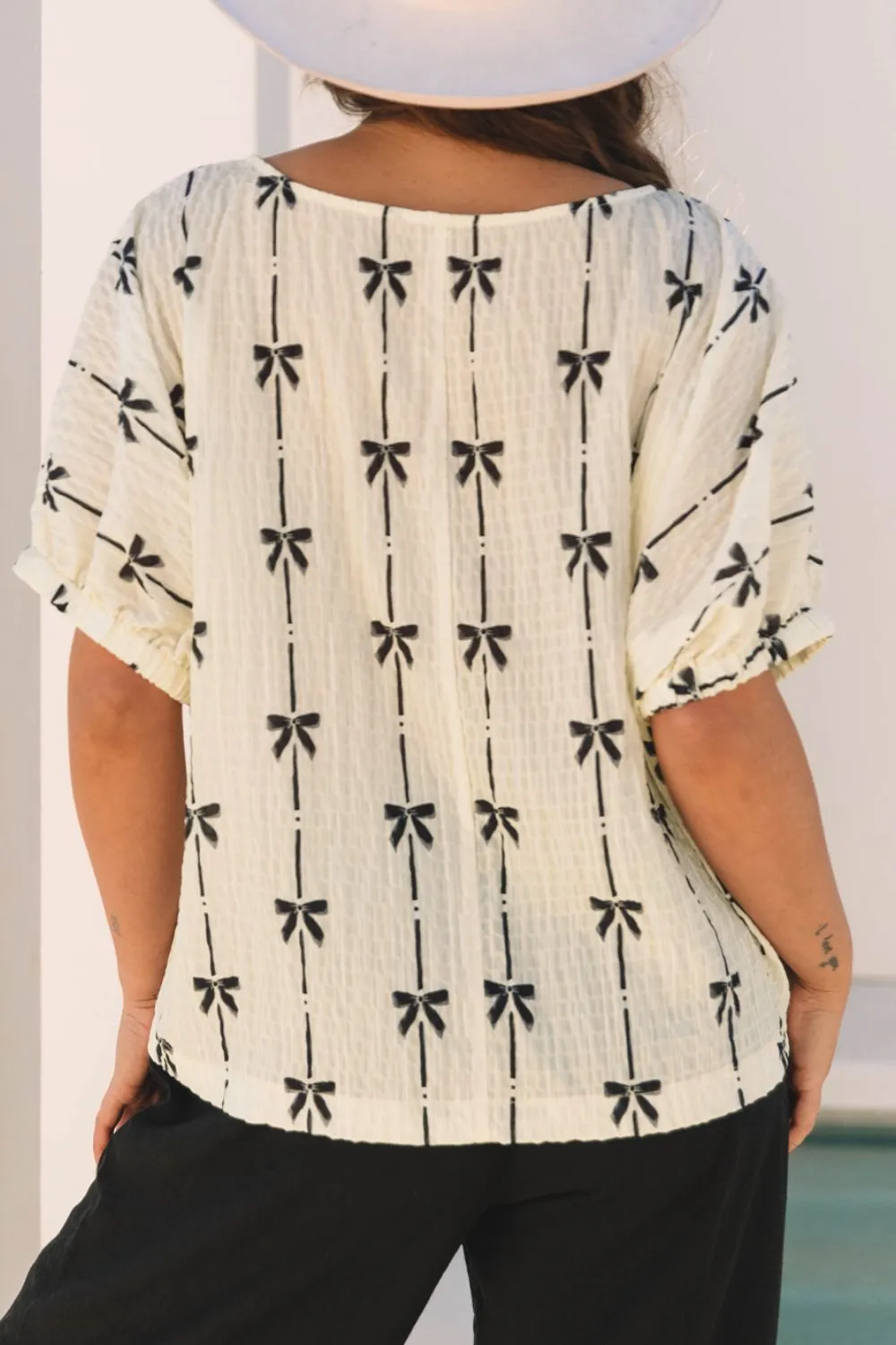 Bow Print Short Sleeve Top sold by Charming Charlie product image thumbnail 4