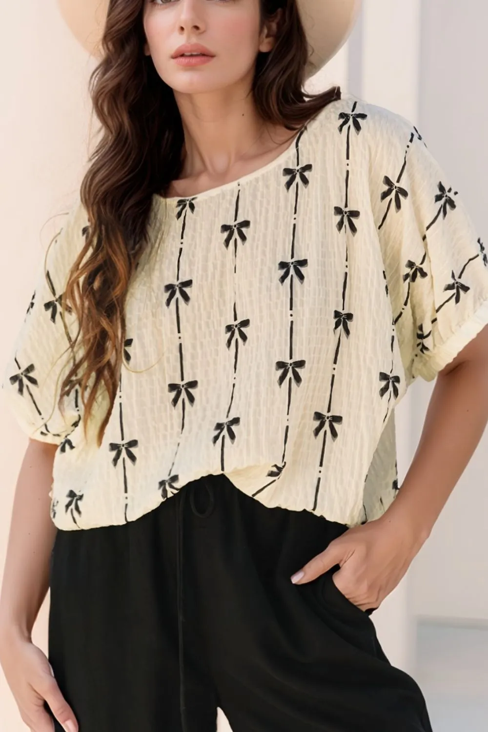 Bow Print Short Sleeve Top sold by Charming Charlie