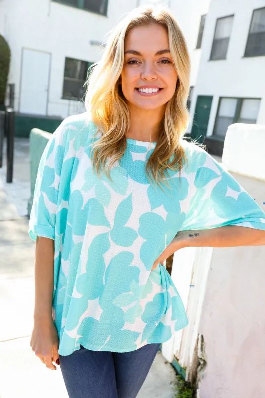 Chasing Dreams Lime Flower Print Waffle Dolman Top sold by Charming Charlie