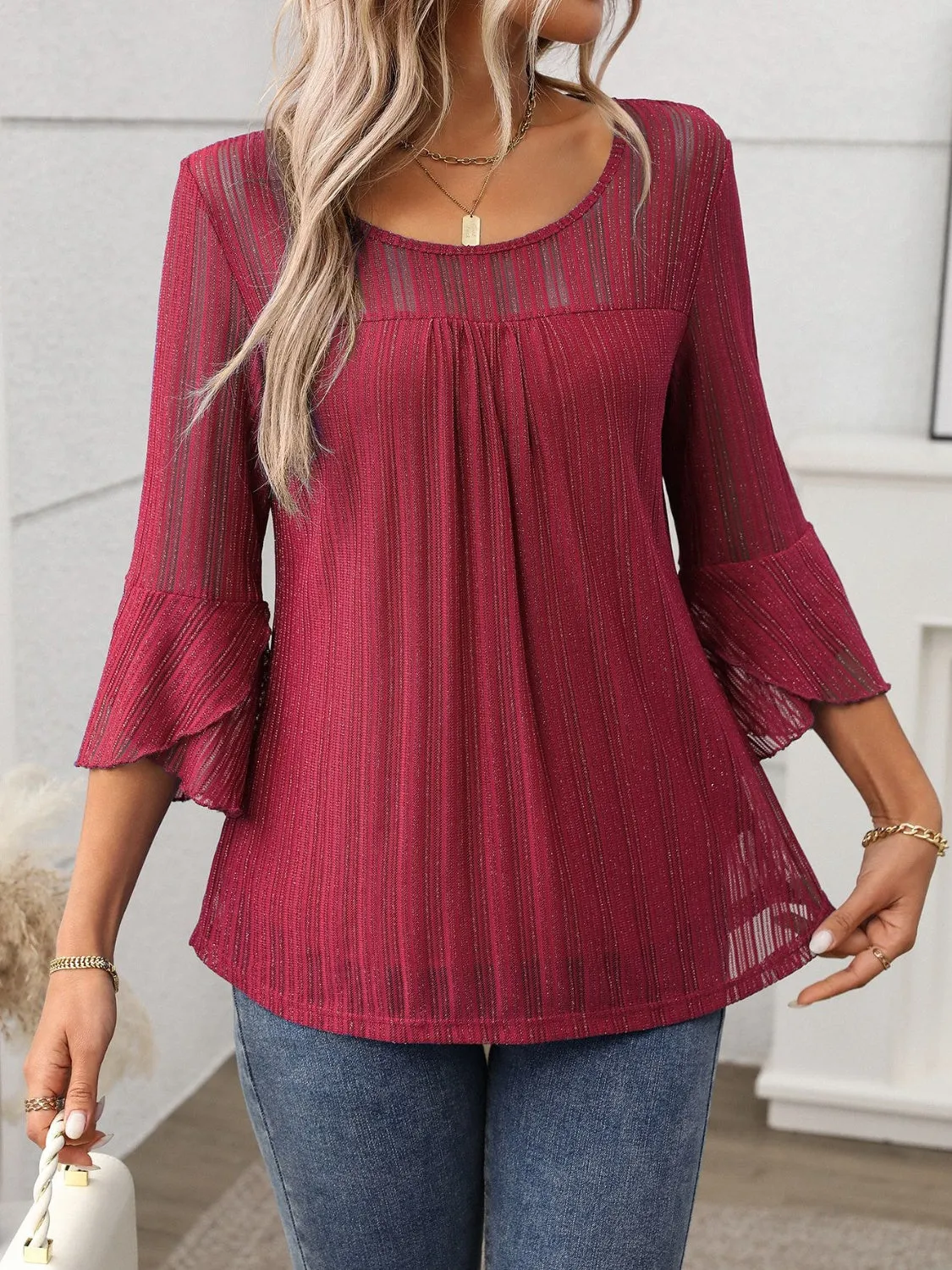Round Neck Three-Quarter Sleeve Top sold by Charming Charlie