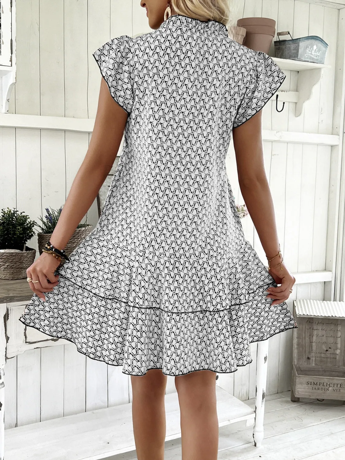 Full Size Ruffled Layered Printed Mini Dress Plus Size sold by Charming Charlie product image thumbnail 2