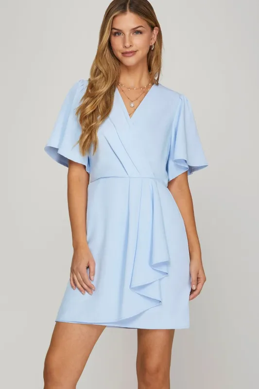 She + Sky Ruffled Surplice Short Flutter Sleeve Mini Dress sold by Charming Charlie