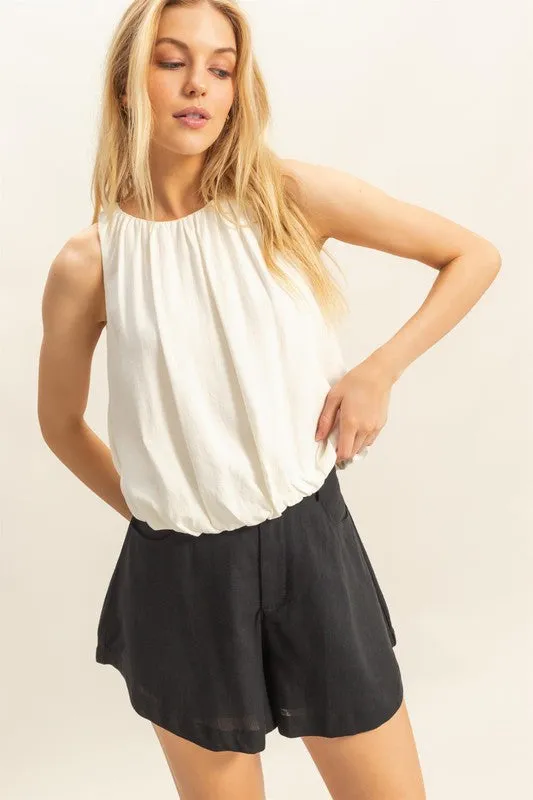 HYFVE Bubble Hem Round Neck Sleeveless Blouse sold by Charming Charlie