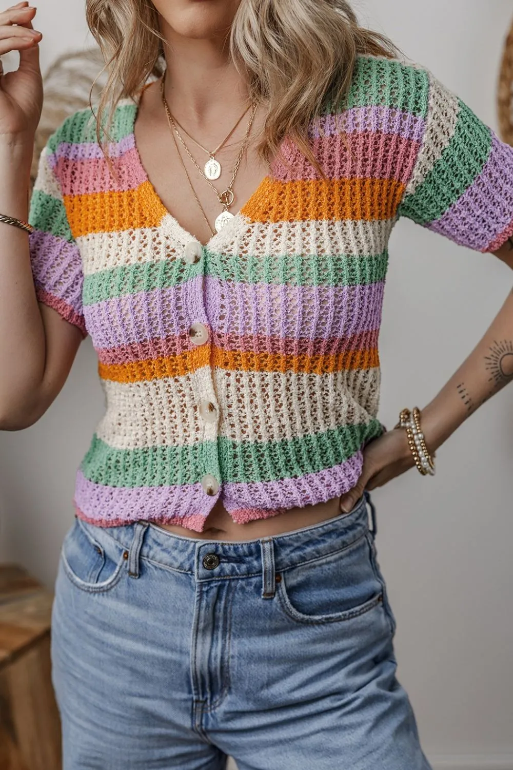 Contrast Striped V Neck Short Sleeve Pointelle Knit Top sold by Charming Charlie